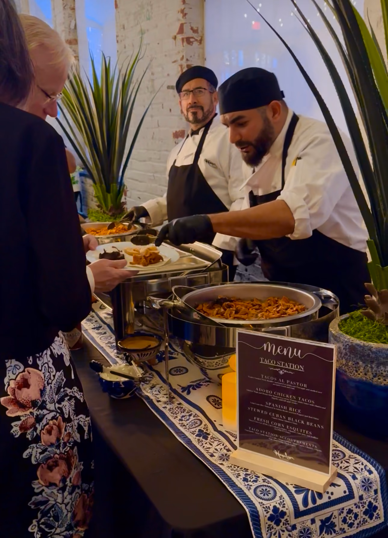 Chefs serving at a buffet station