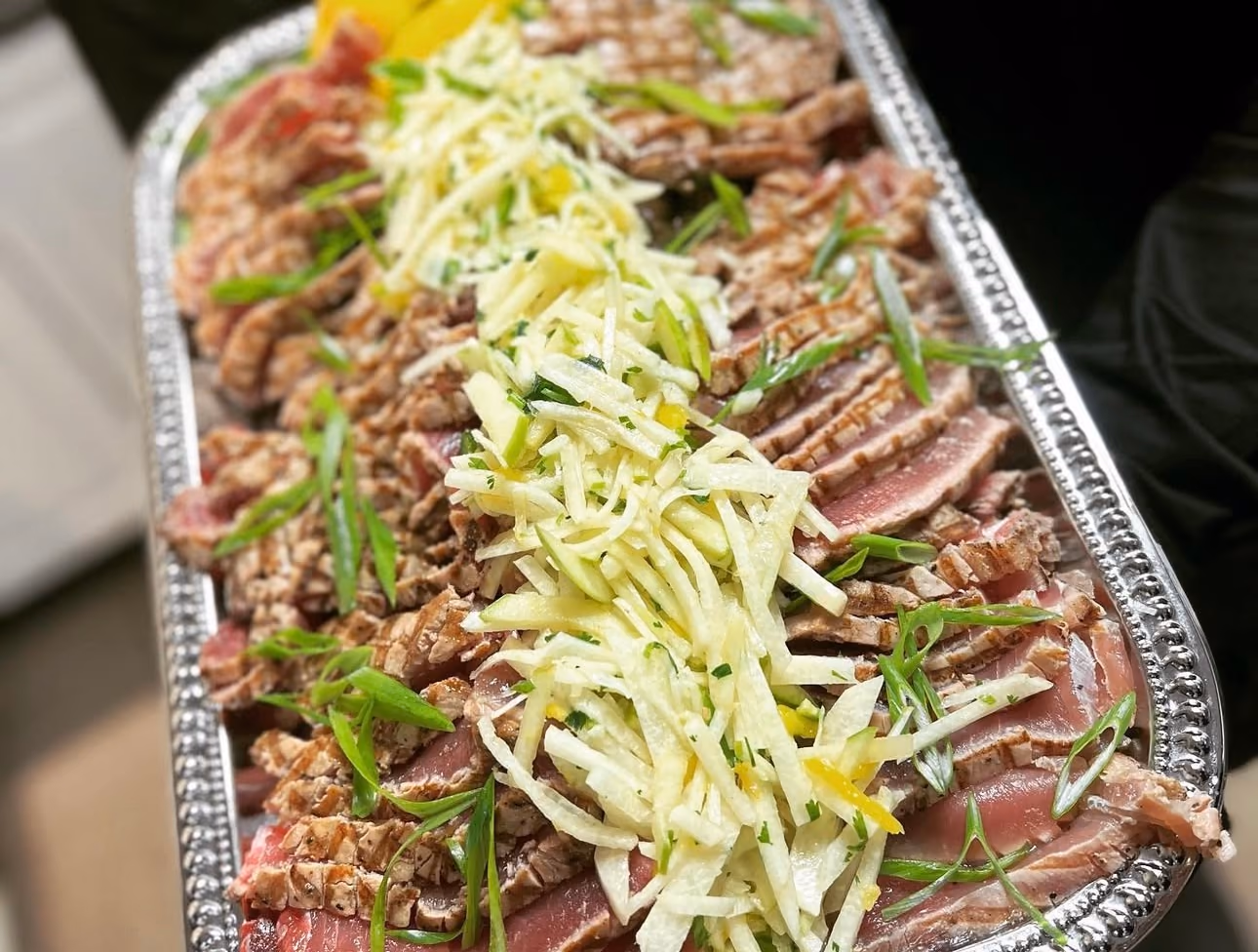 Seared tuna platter with sliced scallion